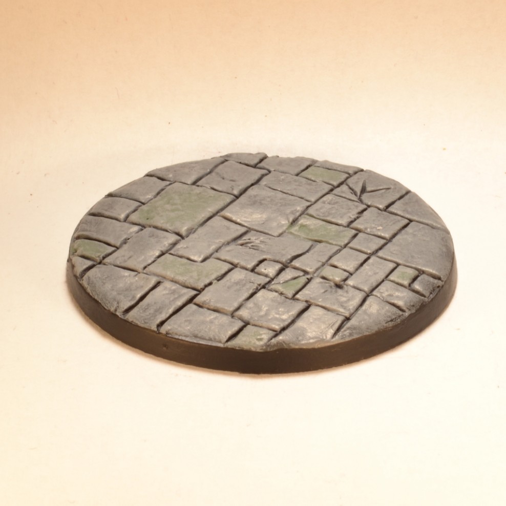 thumbnail interactive-video image 1 of Level Up Your Minis! 50mm Round Lipped Paved Dungeon Scenic Resin Bases - Warmachine Compatible - Made In UK 1 of 4